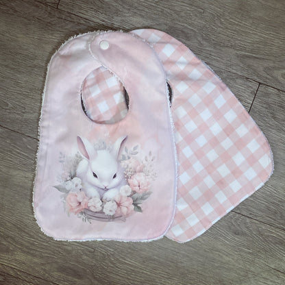Pink baby bib and burp cloth with a bunny design on a wooden surface | Baby Essentials | All Baby Products | Soft Spot Kids | South Africa