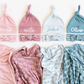 Set of baby hats and blankets with personalized names in pink, blue, and white. | Baby Essentials | All Baby Products | Soft Spot Kids | South Africa