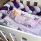 Baby swaddled in a floral blanket with 'Honey my love' text in a crib with colorful bumper pads. | Baby Essentials | All Baby Products | Soft Spot Kids | South Africa
