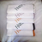 Stack of white Burp Cloths towels with embroidered names on a white background | Baby Essentials | All Baby Products | Soft Spot Kids | South Africa