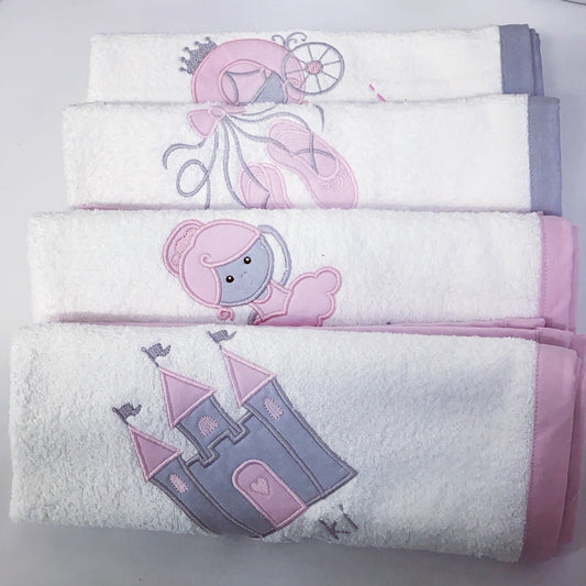 Set of three towels with princess-themed designs on a white background