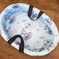 Baby carry cot with animal pattern on a wooden surface | All Nursery Sets | Baby Bedding Sets South Africa | Soft Spot Kids | South Africa