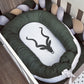 Baby crib with green bumper and white mattress featuring a black antelope design. | All Nursery Sets | Baby Bedding Sets South Africa | Soft Spot Kids | South Africa