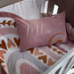 Pink pillow with 'Milia' on a bed with heart-patterned bedding | All Nursery Sets | Baby Bedding Sets South Africa | Soft Spot Kids | South Africa