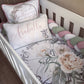 Crib with floral bedding, decorative pillow, and colorful bumper | All Nursery Sets | Baby Bedding Sets South Africa | Soft Spot Kids | South Africa