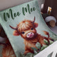 A soft fleece blanket draped over a white crib, featuring a cute illustration of a fluffy Highland cow with the text 'Moo Moo' in dark green script at the top. | All Nursery Sets | Baby Bedding Sets South Africa | Soft Spot Kids | South Africa