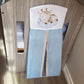 Baby crib with a blue sheet and a pillow with a giraffe design in a wooden crib. | All Nursery Sets | Baby Bedding Sets South Africa | Soft Spot Kids | South Africa