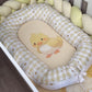 Baby nest with a cartoon duck design on a wooden floor | All Nursery Sets | Baby Bedding Sets South Africa | Soft Spot Kids | South Africa