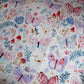 A close-up of a baby doughnut mat featuring watercolour-style butterflies, flowers, leaves, and small mushrooms on a light cream background. | Baby Doughnut Cushions | Infant Support Pillows | Soft Spot Kids | South Africa