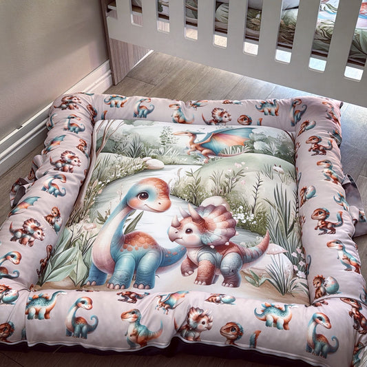 Children's dinosaur-themed bedding set in a crib.