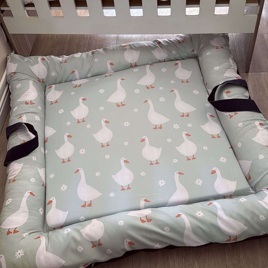 Doughnut with duck pattern on a wooden floor