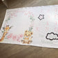 Baby milestone blanket with lion and giraffe illustrations and numbers on a wooden floor. | Baby Essentials | All Baby Products | Soft Spot Kids | South Africa