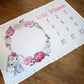 Baby milestone blanket with elephant and floral design on a wooden surface | Baby Essentials | All Baby Products | Soft Spot Kids | South Africa