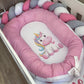 Pink baby nest with unicorn design inside a crib | All Nursery Sets | Baby Bedding Sets South Africa | Soft Spot Kids | South Africa
