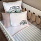 Children's room with crib and pillows featuring vintage car designs. | All Nursery Sets | Baby Bedding Sets South Africa | Soft Spot Kids | South Africa