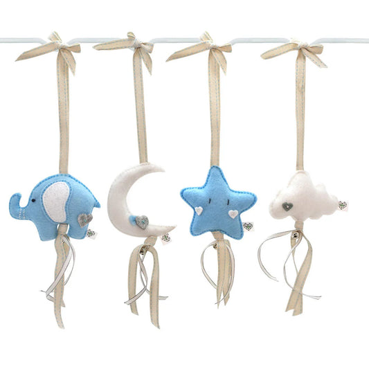 A set of four baby nursery hanging ornaments on a white cord, featuring a blue elephant, a cream crescent moon, a blue star, and a white cloud, each with a cream ribbon bow and dangling ribbon tails.