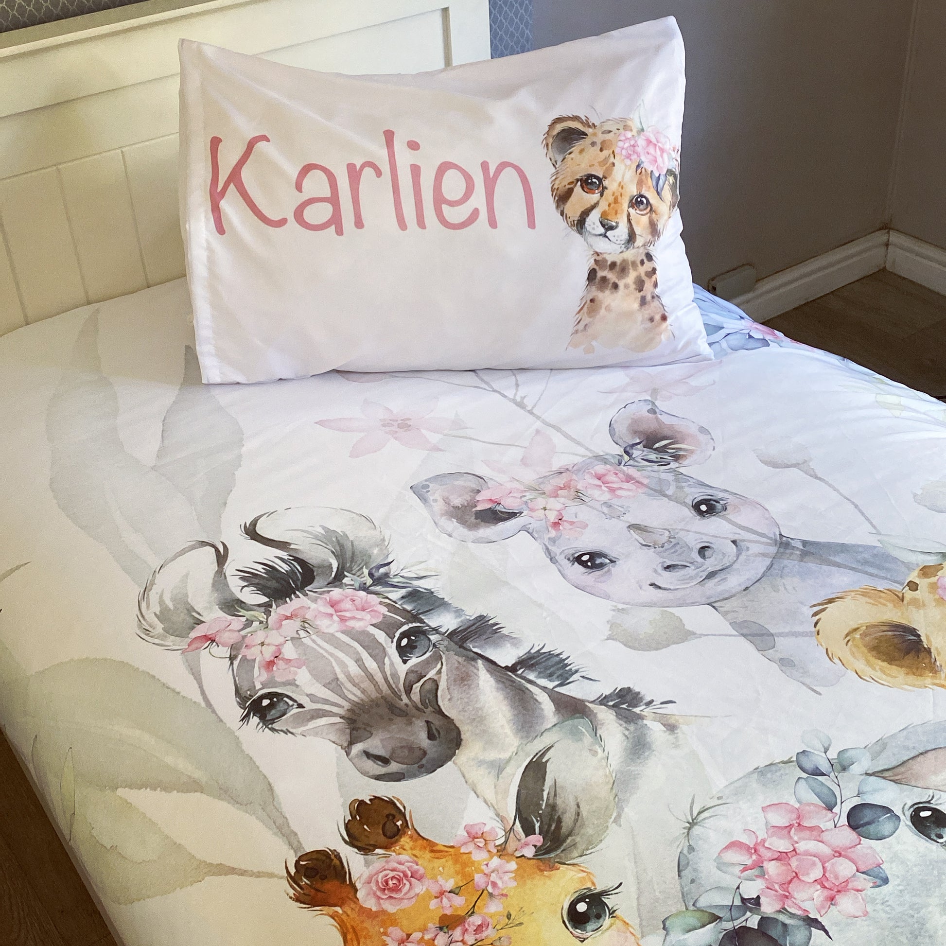 Bedding set with animal design and 'Karlien' on a pillow