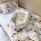 A toddler bedding set with a safari animals theme, including a duvet cover and pillowcase with illustrations of a lion, elephant, and other animals. | Baby Essentials | All Baby Products | Soft Spot Kids | South Africa