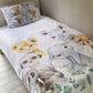 A toddler bedding set with a safari animals theme, including a duvet cover and pillowcase with illustrations of a lion, elephant, and other animals. | Baby Essentials | All Baby Products | Soft Spot Kids | South Africa