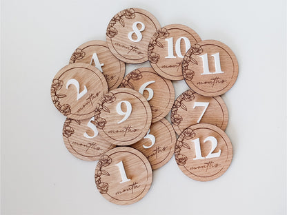 Wooden milestone discs with numbers on a light gray background | Baby Essentials | All Baby Products | Soft Spot Kids | South Africa