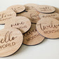 Wooden discs with milestone text for baby's first year on a white background | Baby Essentials | All Baby Products | Soft Spot Kids | South Africa