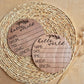 Two wooden baby announcement cards with text on a woven mat. | Baby Essentials | All Baby Products | Soft Spot Kids | South Africa