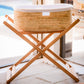 Wicker laundry basket on a wooden stand with a blurred background | Baby Essentials | All Baby Products | Soft Spot Kids | South Africa