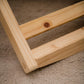 Close-up of a wooden frame on a carpeted floor | Baby Essentials | All Baby Products | Soft Spot Kids | South Africa