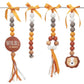 Three beaded baby hanging toys on a white background, each with orange and yellow ribbons, wooden beads in orange, brown, white, and gray, and decorative elements including a round 'WILD of heart' sign and a lion face. | Baby Essentials | All Baby Products | Soft Spot Kids | South Africa