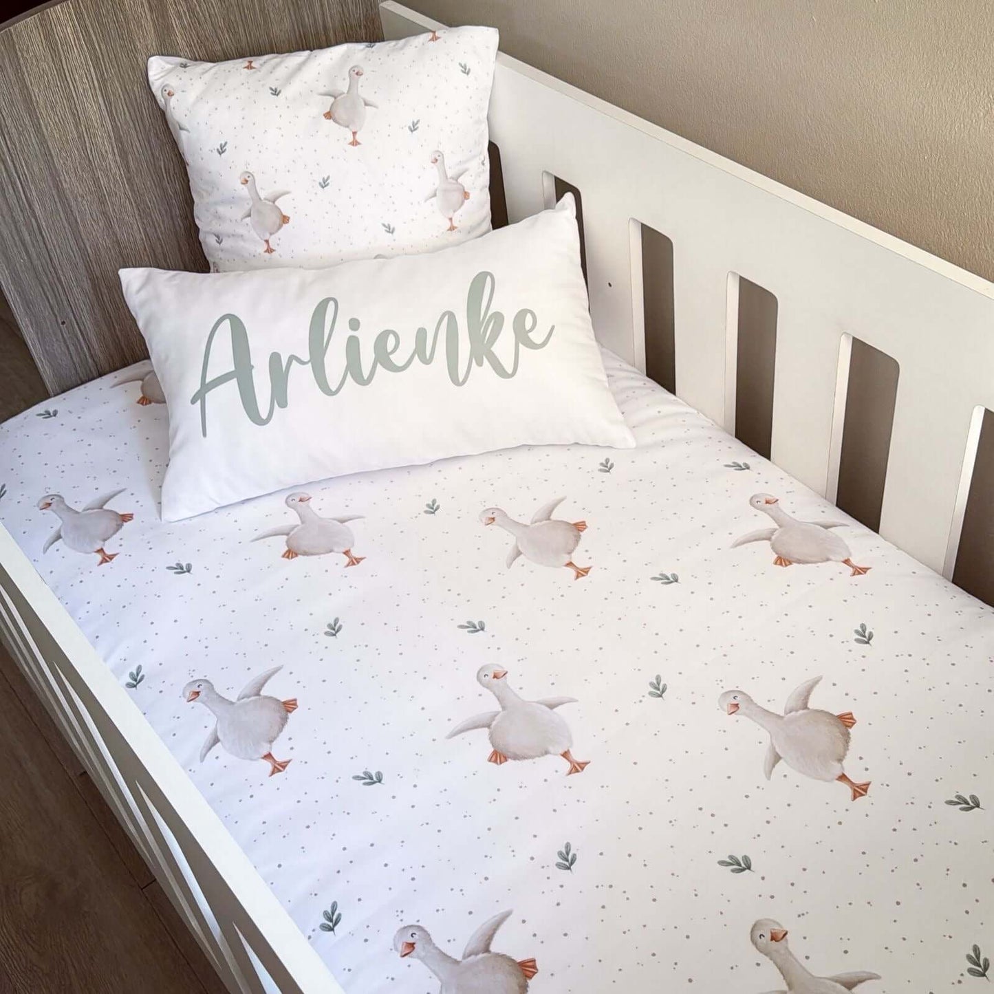 Nursery linen goose in a crib
