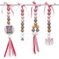 Three pink beaded hanging garlands with pink ribbon bows, tassels, a small bell, and a fox face charm, displayed on a white background. | Baby Essentials | All Baby Products | Soft Spot Kids | South Africa